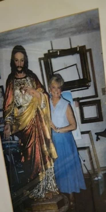 Rita M. Shea with a cathedral-scale Sacred Heart, her atelier